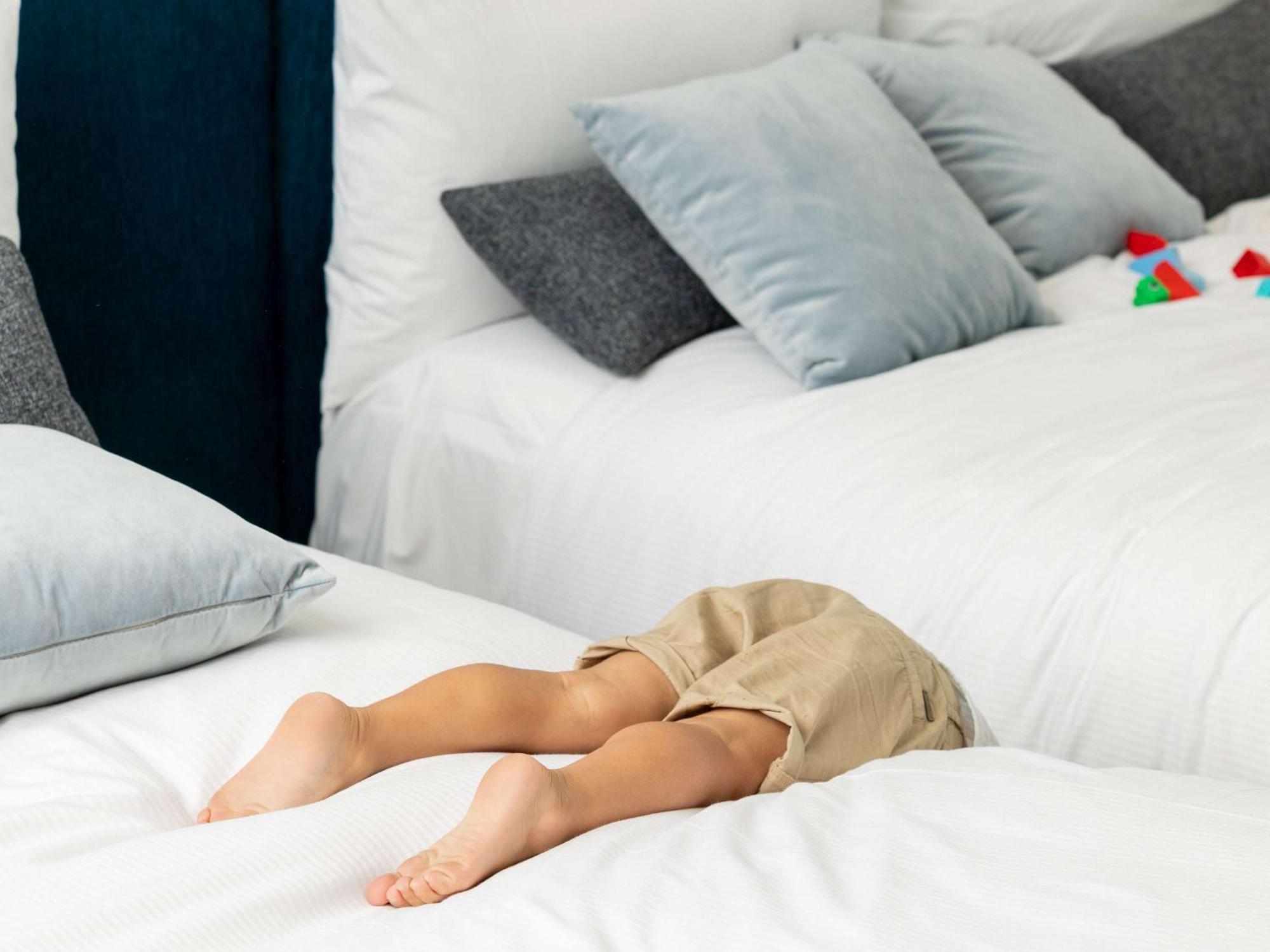 Hotel Chadstone Melbourne Mgallery Collection Ngoại thất bức ảnh A child playing hide-and-seek